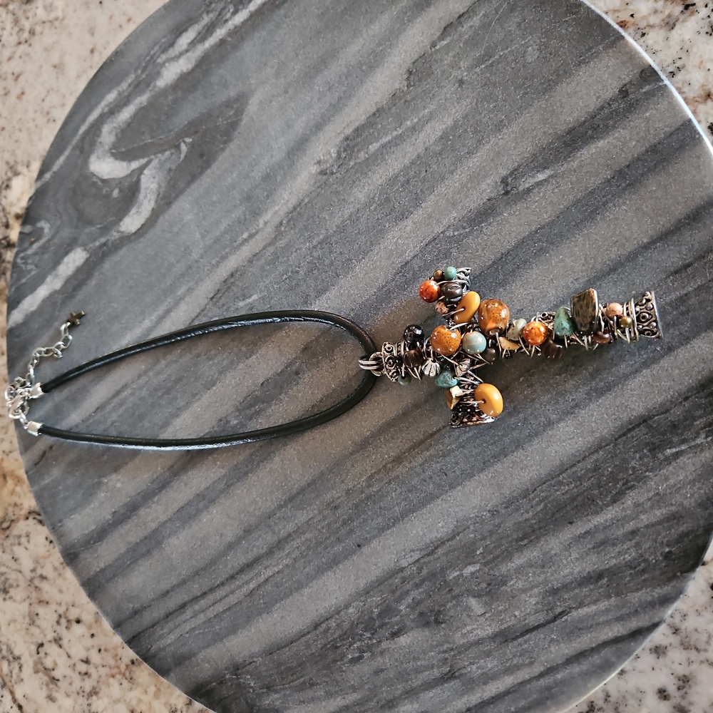 Elegant Silver and Brown Cross Pendant Necklace